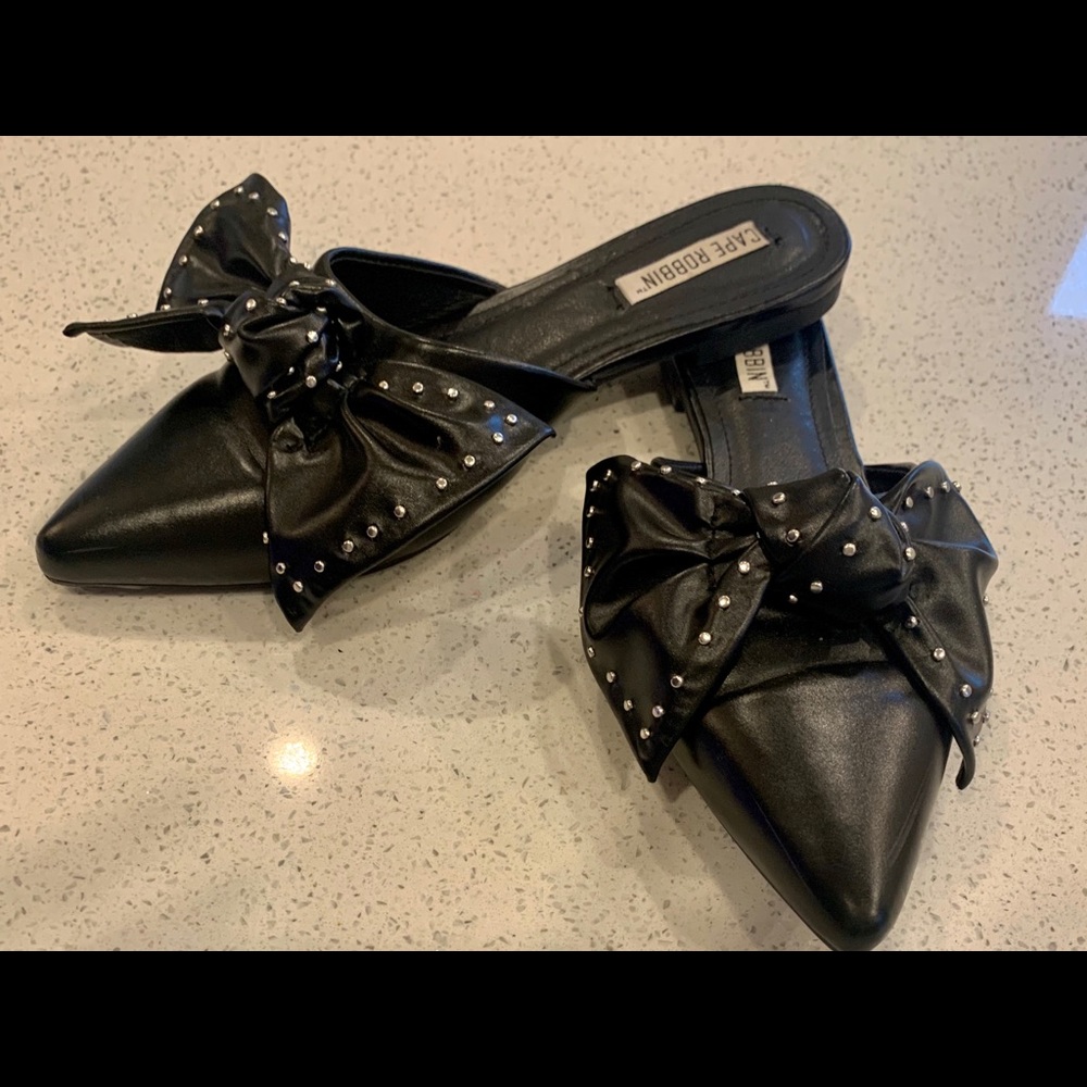 Black studded bow  leather slip ons